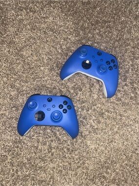 Two Blue Xbox Wireless Controllers
